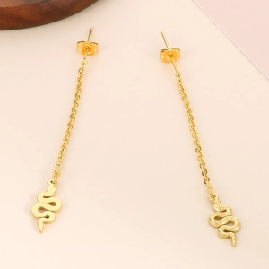 Detailed view of French vintage gold snake drop earrings with textured relief and chain