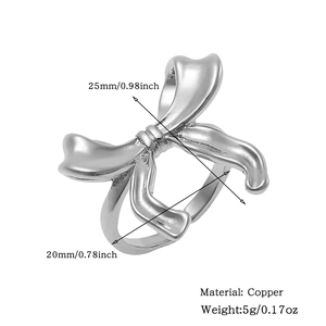 Detailed dimension view of a silver bow knot ring showing the 25mm width and 20mm diameter