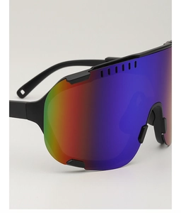Detail view of large cycling sunglasses with rainbow lenses and black frame ventilation