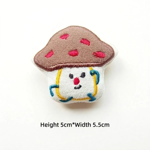 Cartoon mushroom plush patch with smiling face embroidery, measures 5cm height by 5.5cm width