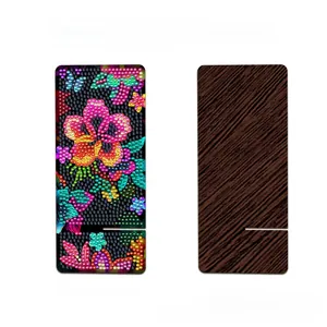 Dual-sided detail of wooden DIY diamond painting stand with floral pattern and base slots