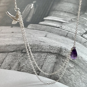 Minimalist 925 sterling silver necklace with purple teardrop pendant and swallow charm