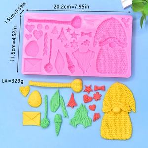Macro view of pink silicone mold with gnome and tree shapes for Christmas DIY crafts