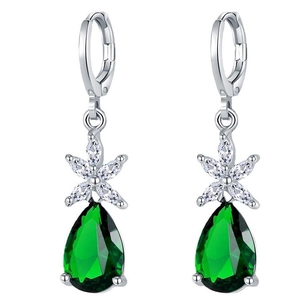 Elegant silver teardrop earrings featuring sparkling green gemstones and petals