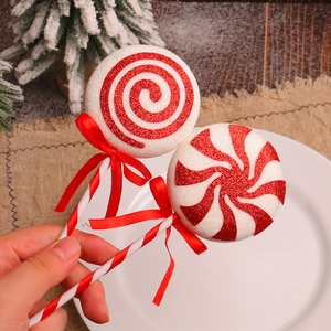 Handheld red and white Christmas lollipop ornaments with glitter and ribbon bows