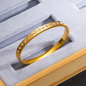 Elegant gold titanium steel diamond-set rhombus pattern bangle with secure clasp