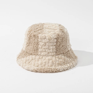 Close-up of plush beige faux lamb wool fisherman hat with soft thick thermal texture