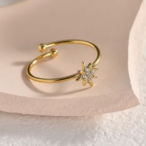 Elegant gold titanium steel open ring with adjustable band and sparkling star decoration