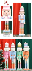 Detailed close-up of macaron-colored wooden nutcracker dolls with festive glitter details