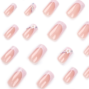 Pink French press-on nails with 3D white flowers, sequins and colorful rhinestones