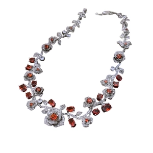 Vintage rose pendant necklace with red zircon floral design in silver finish
