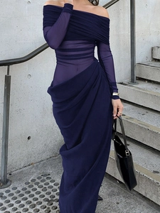 Detail of dark blue off-shoulder dress with mesh sheer fabric and ruched texture details