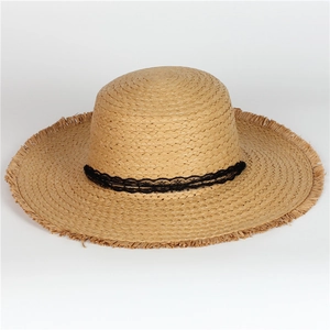 Women's wide brim straw hat with black lace ribbon and chic frayed edges for beach vacations
