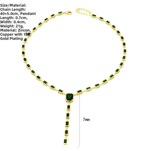 Close-up of 18k gold plated copper necklace with inlaid green baguette zircons