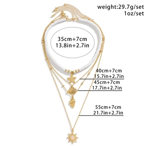 Detailed dimensions of multi-layered sun and seashell pendant necklace with measurements