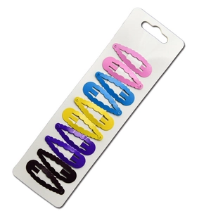Détail de 10 barrettes à cheveux ondulées en métal coloré sur carte de support