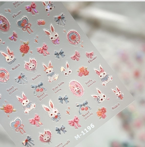 Close-up of M-1196 embossed nail stickers with cute rabbit, rose and cherry patterns