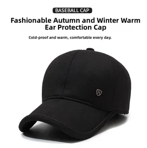 Detail view of winter baseball cap with shield metal logo and textured wool fabric