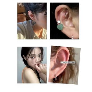 Detailed comparison of 8mm, 10mm, and 12mm stainless steel hoop earrings on ear