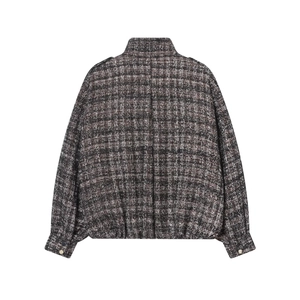 Rear view of a dark grey tweed bomber jacket with metallic threads and woven texture