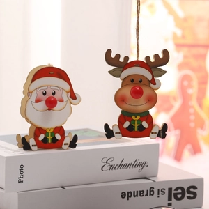Incantevoli decorazioni natalizie in legno con Babbo Natale e renne per l'albero