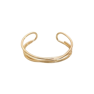 Elegant gold-layered crossover wave bangle with a minimalist open cuff design