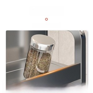 Detail of stainless steel kitchen rack featuring a high protective guardrail for spice jars