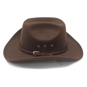 Detail of brown felt cowboy hat showing woven leather band and metal ventilation eyelets