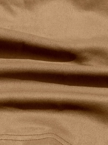 Close-up of brown cotton fabric texture showing fine knit pattern on casual windbreaker