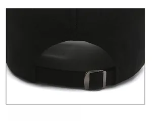 Detail of black baseball cap with adjustable metal buckle for customized comfort fit