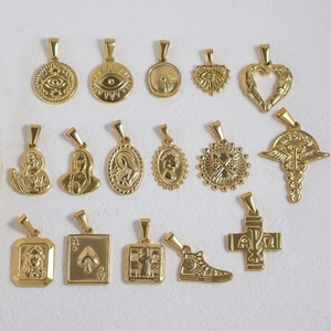 Vintage 24K gold-plated stainless steel pendants with heart, eye, and cross motifs