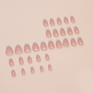 Minimalist almond-shaped press-on nails with soft pink base and light blue french tips