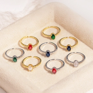 Irregular adjustable open rings with colorful zircon gemstones on velvet tray