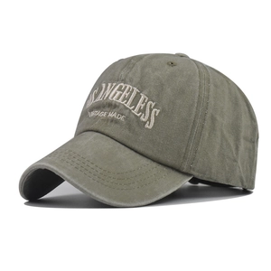 Detail of vintage Los Angeles embroidery on washed cotton olive green baseball cap