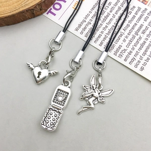 Vintage silver alloy charms featuring a winged heart, flip phone, and fairy with black cords