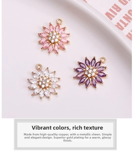 Detailed view of colorful zircon daisy flower pendants in pink, purple and white hues
