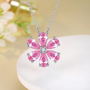 Elegant S925 sterling silver necklace featuring a pink floral pendant with teardrop petals