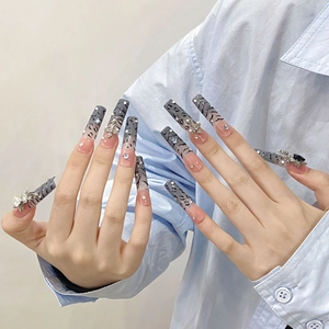 Handmade long coffin fake nails with zebra print and silver metal cross charms