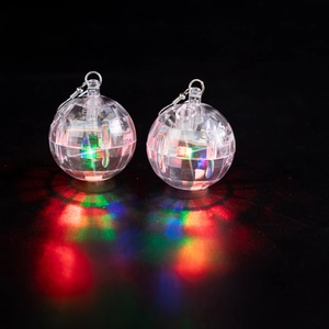 Glow LED disco ball earrings with colorful light effects on a sleek black background