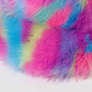 Rainbow faux fur bucket hat with thick plush texture in vibrant multi-color blend