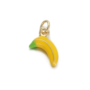 Macro view of a realistic yellow banana pendant charm with green enamel and gold ring