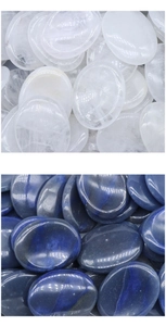 Polished crystal guasha massage stones in oval shape with clear and navy blue finish