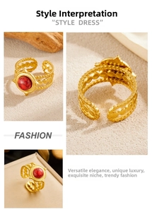 Detailed macro view of vintage open ring with red stone and hollow circle link design