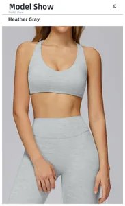 Heather grey sports bra and yoga pants set with brushed texture on professional model