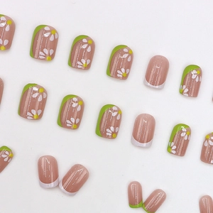 Short grass green French press-on nails with daisy floral prints and white tips