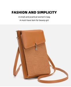 Detail of brown pleated leather crossbody bag with rhombic pendant and smooth finish