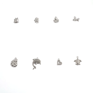 Detailed set of eight silver-plated animal charms with sparkling diamond accents