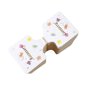White paper display cards with floral patterns for hair accessories and jewelry packaging