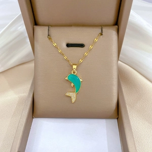 Luxurious titanium steel necklace featuring a green dolphin pendant with sparkling crystals