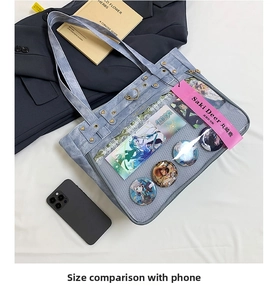Blue oxford tote bag with transparent PVC window for anime badge display